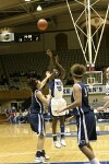 Bridgette Mitchell takes a jump shot from the top of the key