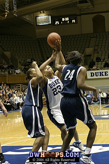 Wanisha Smith twists for a shot in the lane