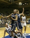 ...and crashes to the floor as Penn State's Charity Renfro looks for a possible rebound