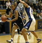 Wanisha Smith guards Penn State's Tyra Grant...