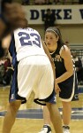 Brianne O'Rourke surveys the court, guarded by Wanisha Smith