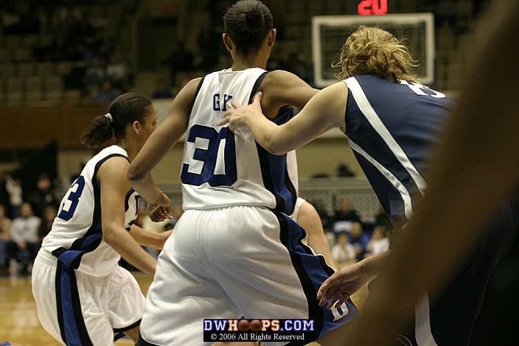 Penn State's Amanda Brown gets a hand on Carrem Gay in the post