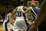 Penn State's Amanda Brown gets a hand on Carrem Gay in the post