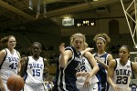 Penn State's Amanda Brown (center) can't save this one from going out of bounds