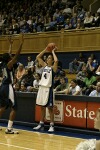 Abby Waner looks to inbound over ODU's Jessica Canady