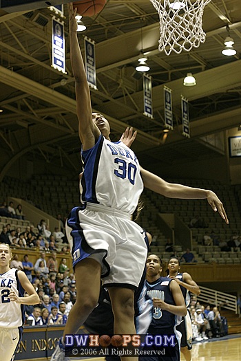 Carrem Gay, again ahead of the pack on a fast break, finishes with a left handed layup