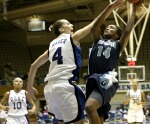 Abby Waner attempts to block ODU forward Tish Lyons' shot, but is whistled for the foul