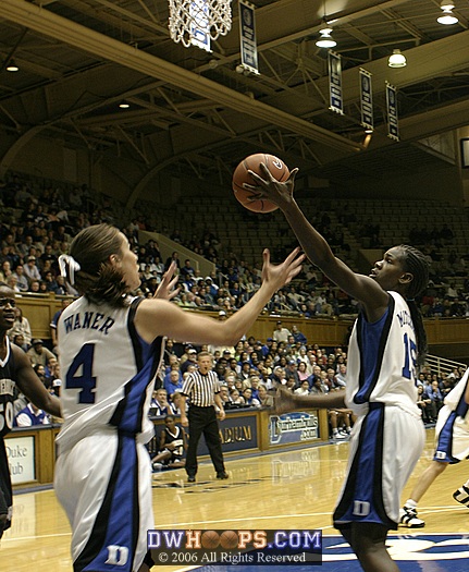 Bridgette Mitchell pulls in a rebound that Abby Waner was ready for (1 of 2)