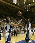 Bridgette Mitchell pulls in a rebound that Abby Waner was ready for (1 of 2)