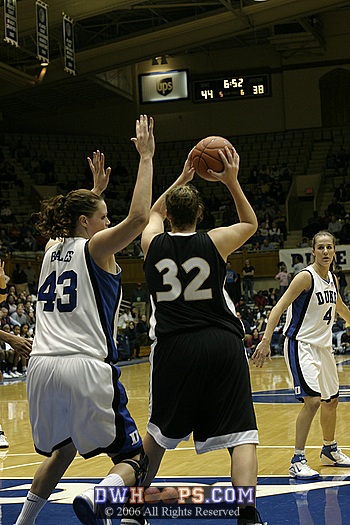 Tough "D" from Alison Bales forces the ball back out of the post (2 of 3)