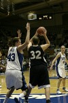 Tough "D" from Alison Bales forces the ball back out of the post (2 of 3)