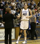 Alison Bales shakes hands with Texas Head Coach Jody Conradt