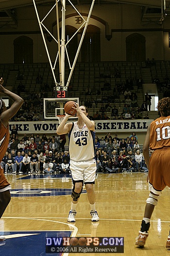 ...Alison Bales at the top of the key for the jumper