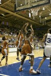 Earnesia Bailey goes over the back of Wanisha Smith