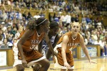 Tiffany Jackson (left), Bridgette Mitchell, and Erika Arrarian await a Duke free throw attempt (1 of 2)