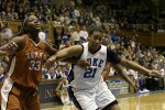 Tiffany Jackson (left), Joy Cheek, and Earnesia Williams fight for position on a Duke free throw attempt (2 of 2)