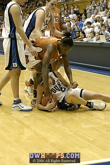 Emily Waner battles for a loose ball (2 of 4) - note Ernisha Bailey grabbing Emily's left hand!