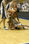 Emily Waner battles for a loose ball (2 of 4) - note Ernisha Bailey grabbing Emily's left hand!