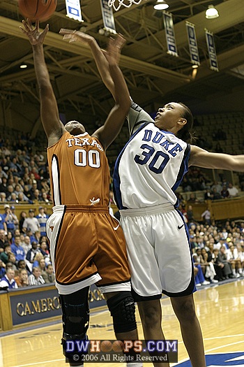 Carrem Gay (right) attempts to block Earnesia Williams