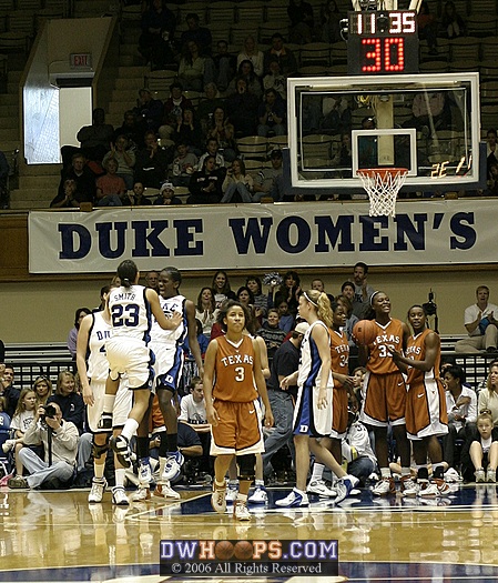 Wanisha Smith (23) and Bridgette Mitchell celebrate a big play