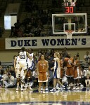 Wanisha Smith (23) and Bridgette Mitchell celebrate a big play