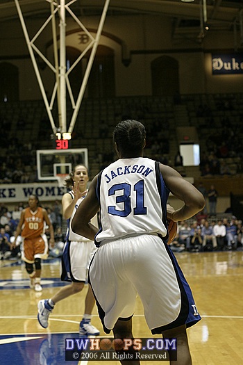 Keturah Jackson about to pass to Abby Waner